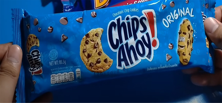 Hand Holding Pack of Chips Ahoy